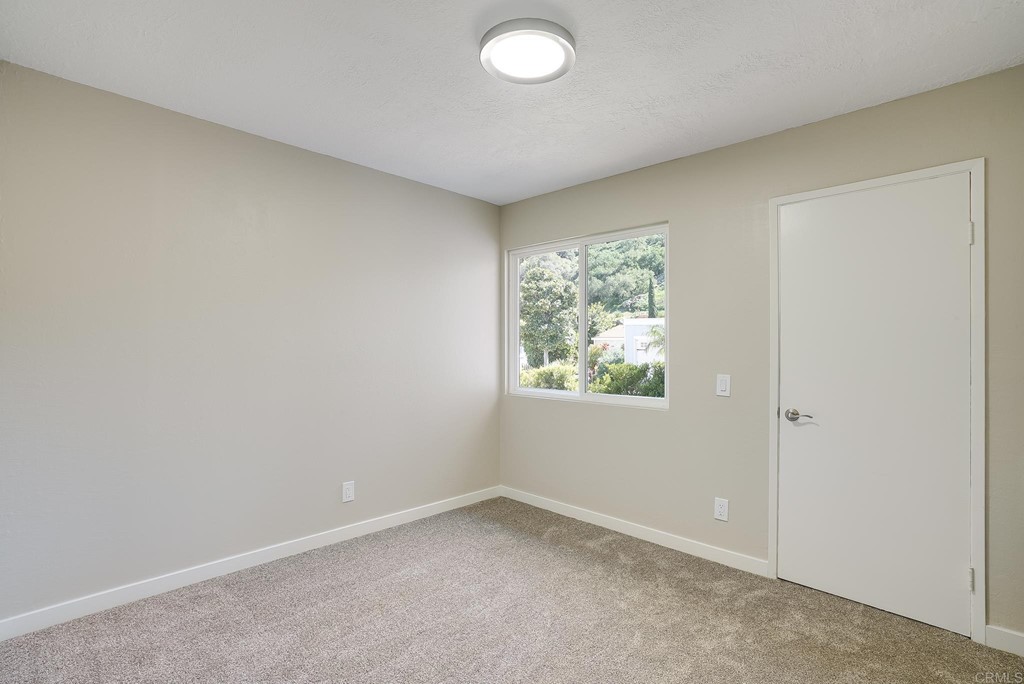 225 Hypoint Place Escondido, CA 92027 - Photo 24 of 63 an empty room with a window