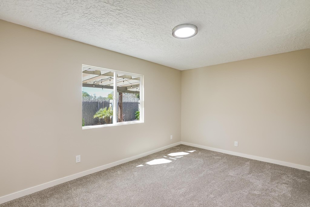 225 Hypoint Place Escondido, CA 92027 - Photo 26 of 63 an empty room with a window