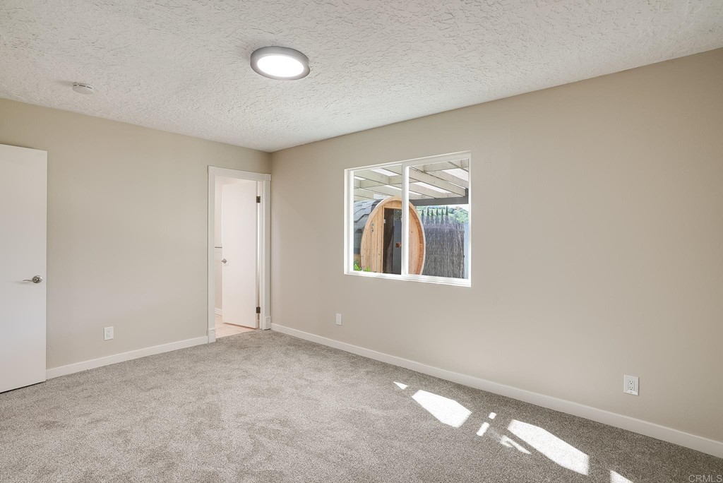 225 Hypoint Place Escondido, CA 92027 - Photo 27 of 63 a view of an empty room with a window