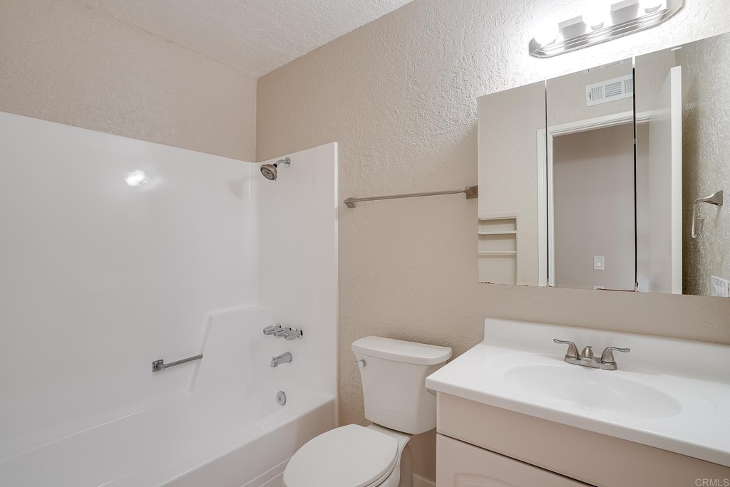 225 Hypoint Place Escondido, CA 92027 - Photo 34 of 63 a bathroom with a sink toilet and shower
