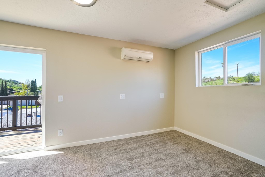 225 Hypoint Place Escondido, CA 92027 - Photo 4 of 63 an empty room with a window