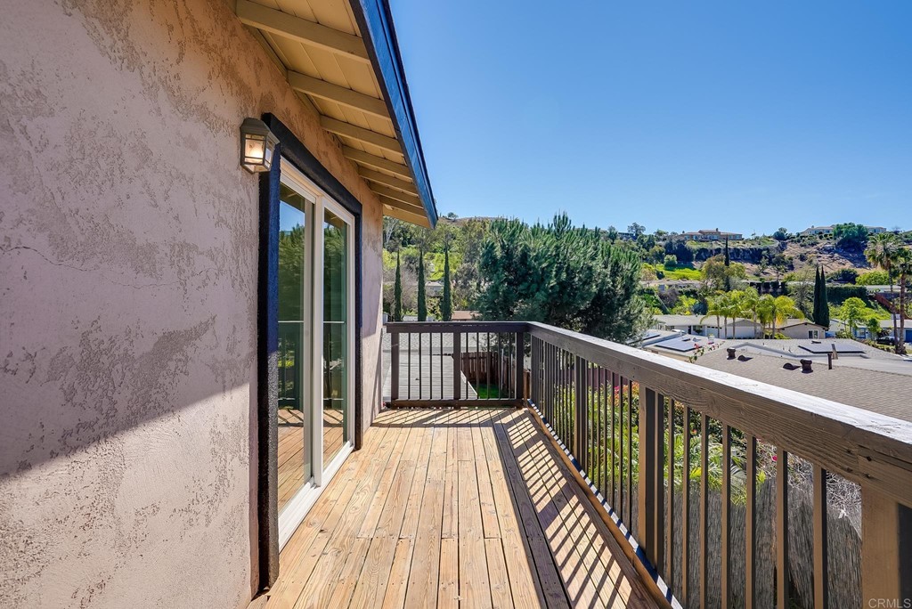 225 Hypoint Place Escondido, CA 92027 - Photo 41 of 63 a view of balcony of a house and wooden floor
