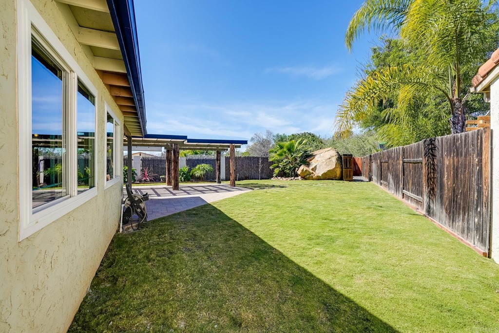225 Hypoint Place Escondido, CA 92027 - Photo 42 of 63 a view of house with backyard and outdoor seating