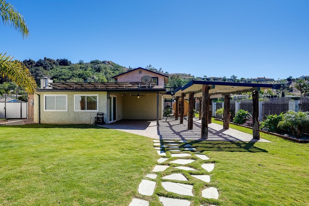 225 Hypoint Place Escondido, CA 92027 - Photo 44 of 63 a view of a house with backyard porch and sitting area