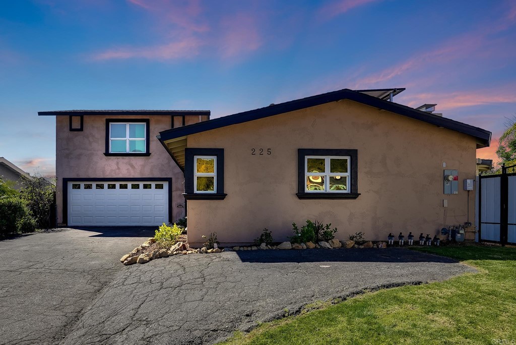 225 Hypoint Place Escondido, CA 92027 - Photo 51 of 63 a front view of a house with a yard