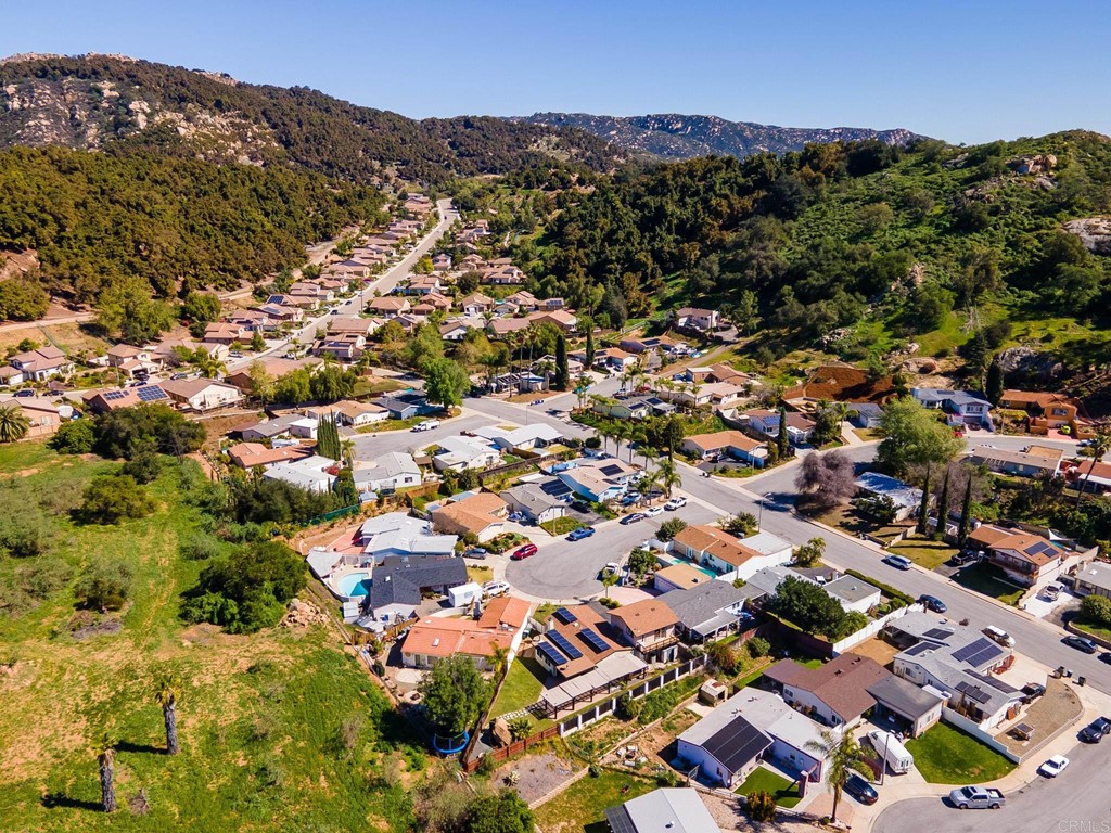 225 Hypoint Place Escondido, CA 92027 - Photo 57 of 63 an aerial view of residential houses with outdoor space and trees