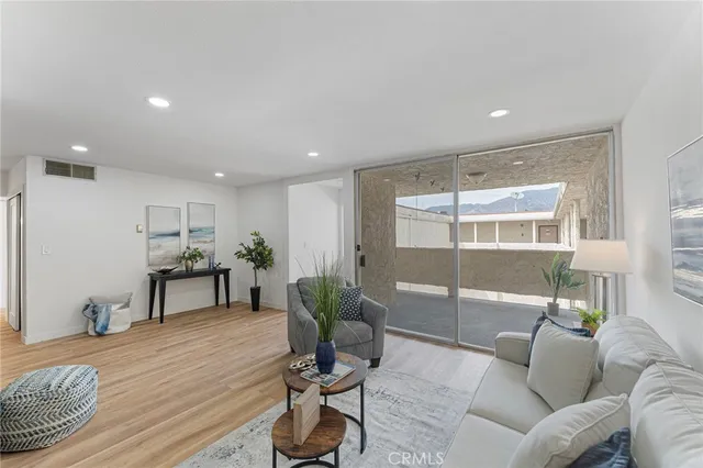 a living room with furniture and a table