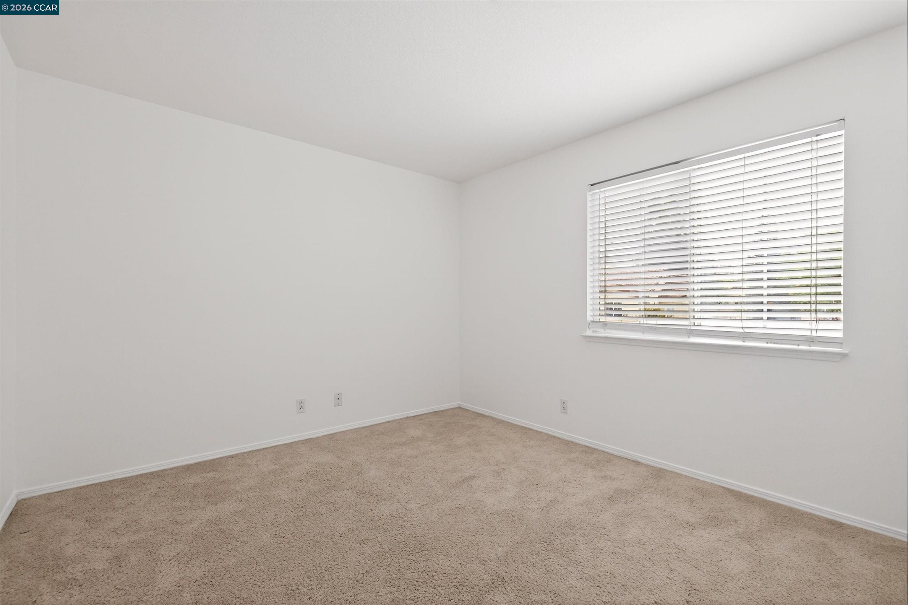124 Coralflower Lane San Ramon, CA 94582 - Photo 20 of 47 an empty room with a window