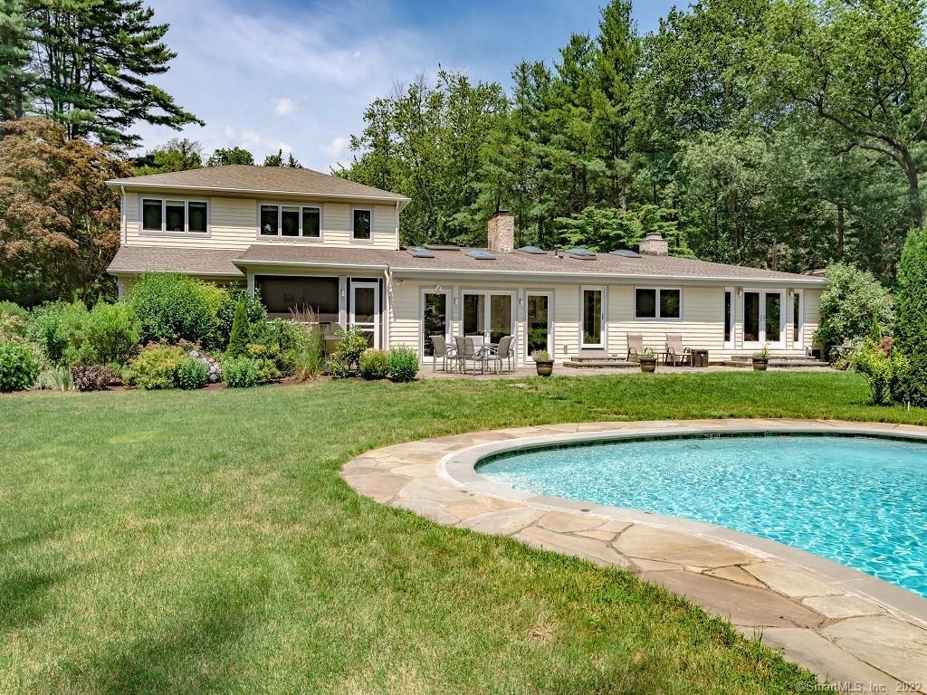 20 Stoneboat Road Westport, CT 06880 - Photo 1 of 1 a front view of a house with garden