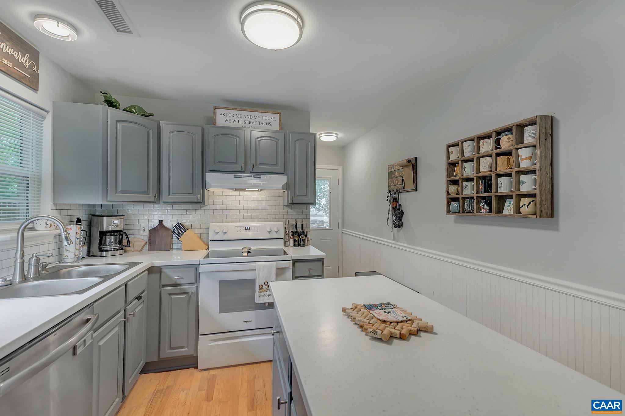 92 Riverside Drive Palmyra, VA 22963 - Photo 17 of 48 a kitchen with stainless steel appliances granite countertop a sink cabinets and stove
