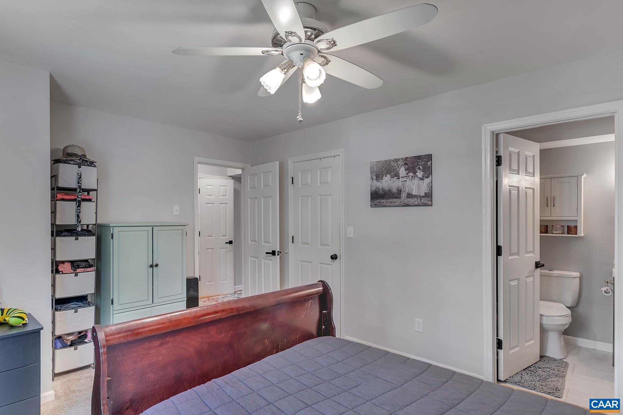 92 Riverside Drive Palmyra, VA 22963 - Photo 22 of 48 a view of a hallway with closet and wooden floor