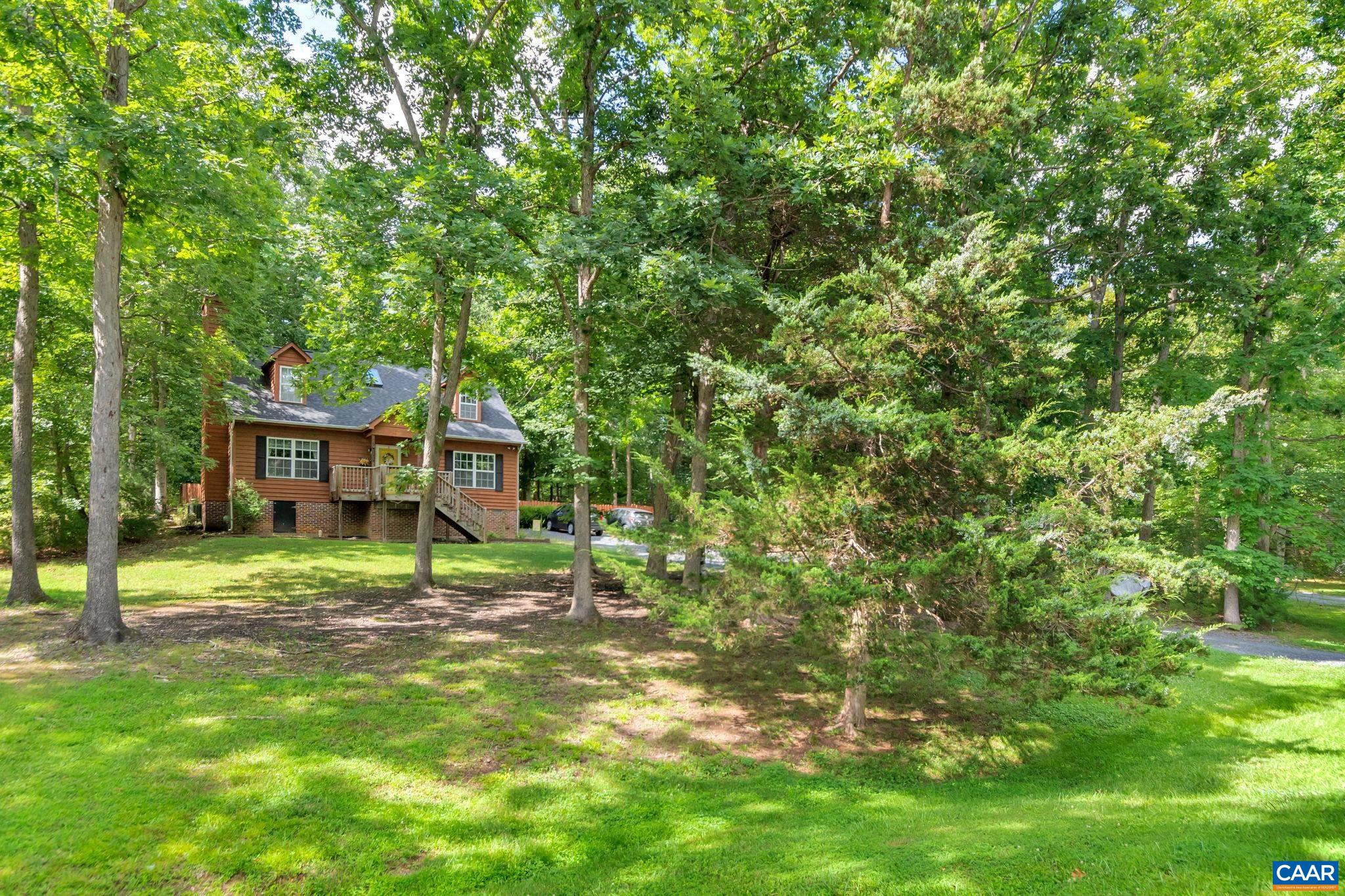 92 Riverside Drive Palmyra, VA 22963 - Photo 47 of 48 a house is sitting in middle of the green field