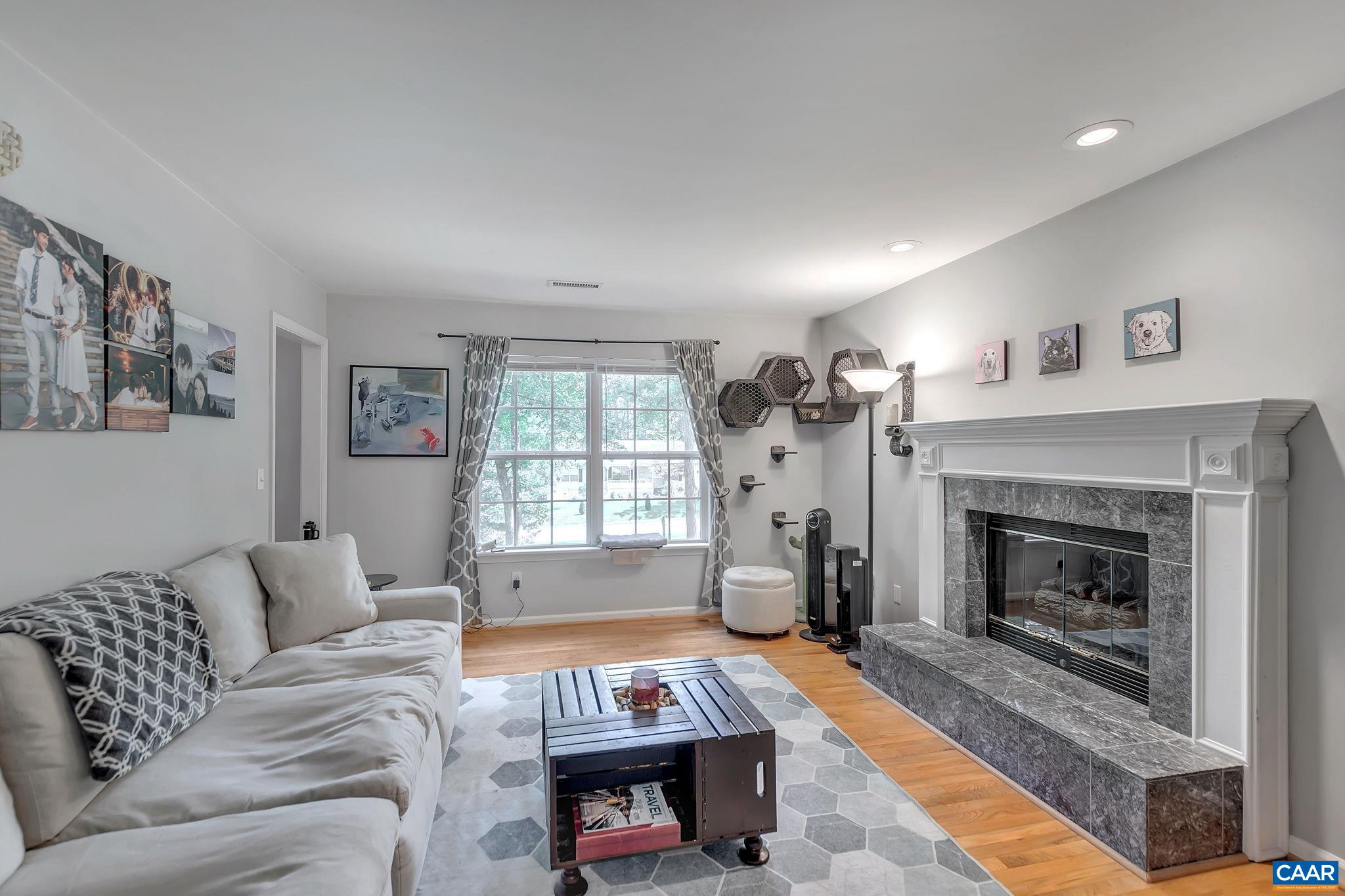 92 Riverside Drive Palmyra, VA 22963 - Photo 6 of 48 a living room with furniture and a fireplace