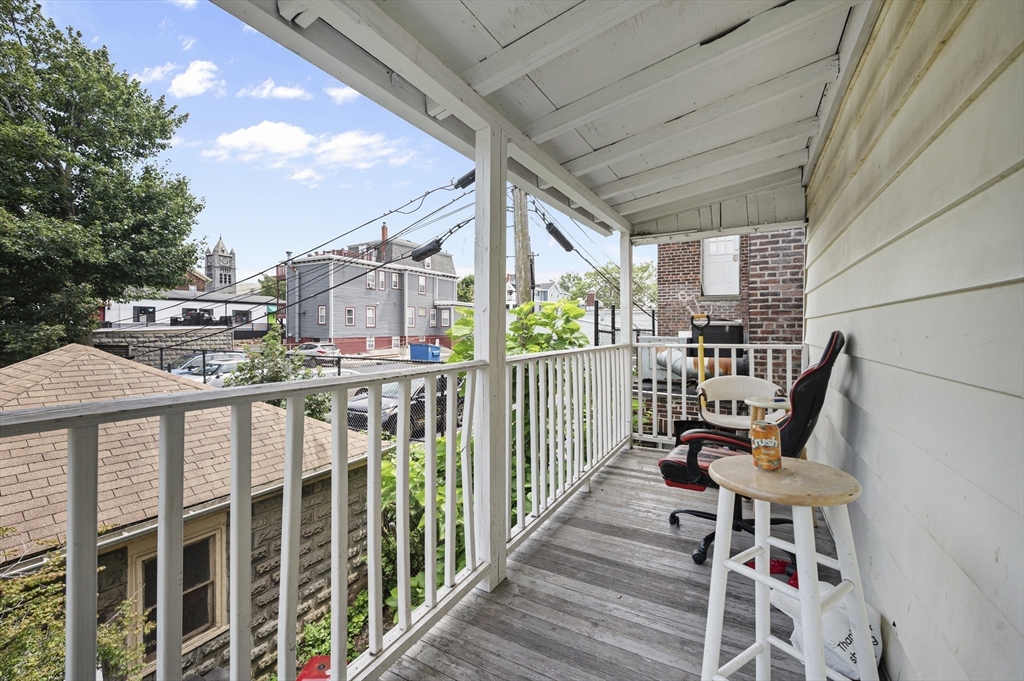 89 Central Street Somerville, MA 02143 - Photo 27 of 33 a view of a balcony with furniture