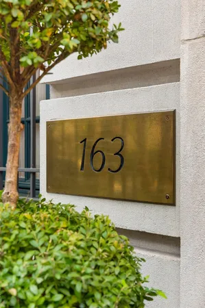 a sign that is on the side of a building