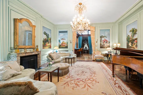 a living room with a table or chairs and a wooden floor