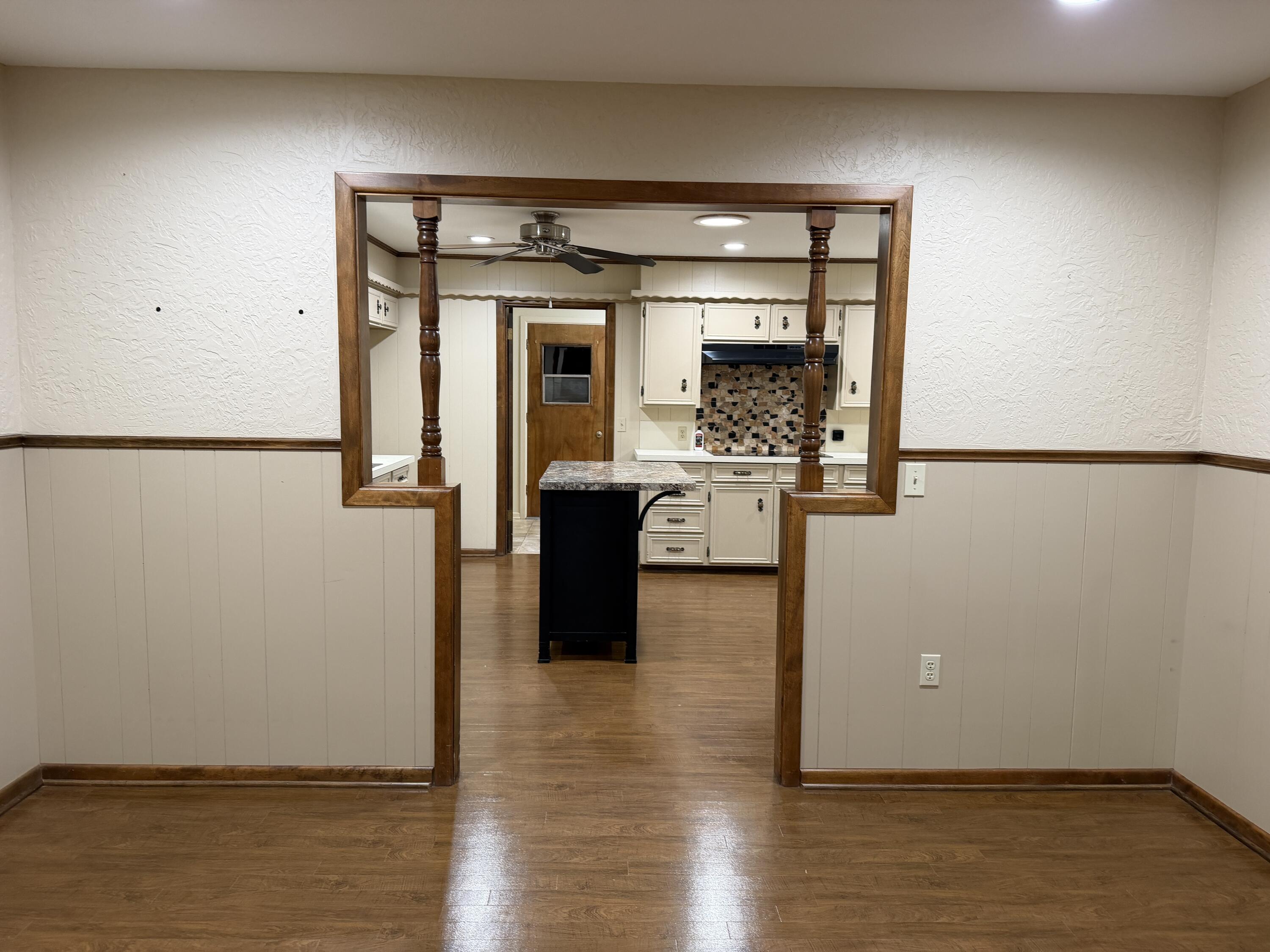 1603 South 8th Street Lamesa, TX 79331 - Photo 11 of 39 a view of kitchen with stainless steel appliances granite countertop and refrigerator