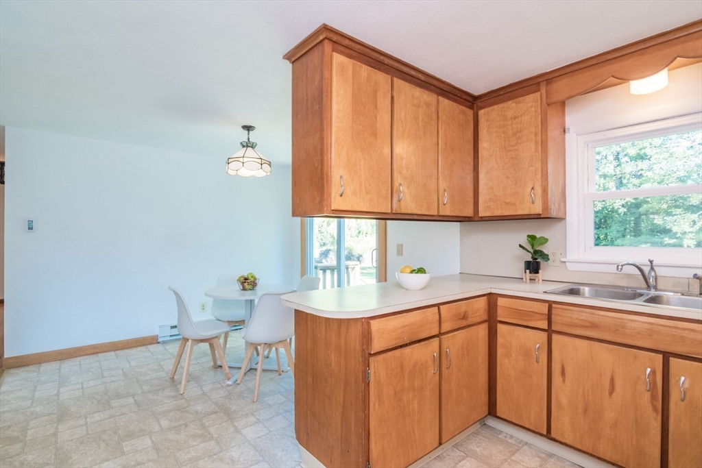 40 Farmington Road Amherst, MA 01002 - Photo 11 of 26 a kitchen with a sink cabinets and window