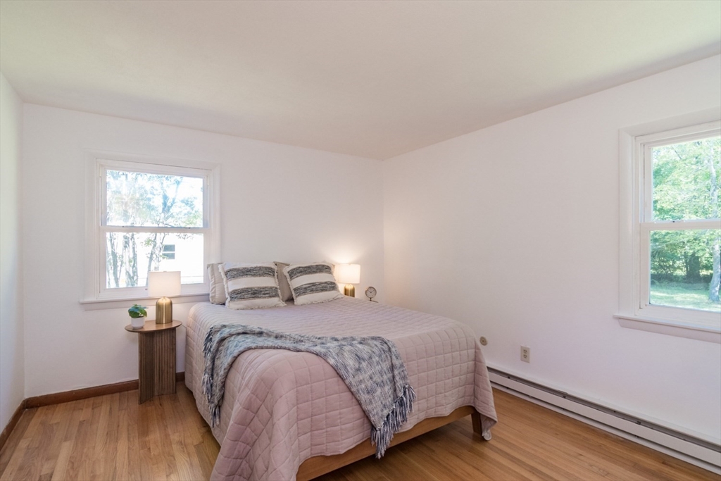 40 Farmington Road Amherst, MA 01002 - Photo 15 of 26 a bedroom with a bed and a window