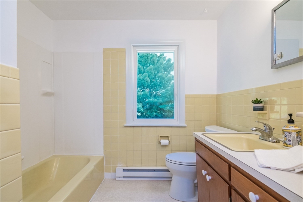 40 Farmington Road Amherst, MA 01002 - Photo 17 of 26 a bathroom with a sink a toilet and a bathtub
