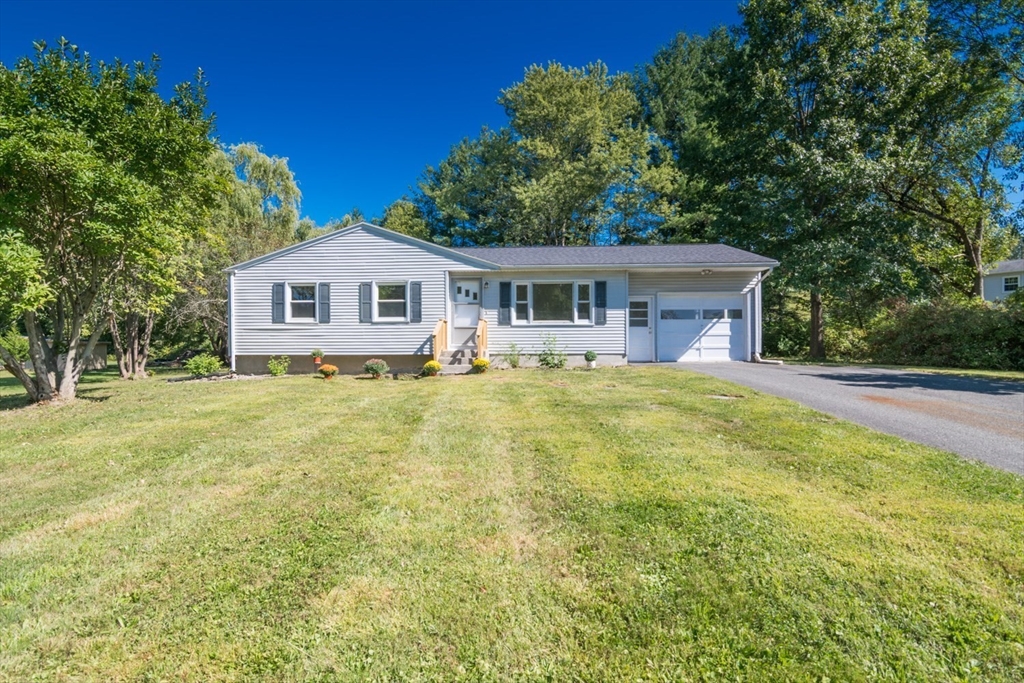 40 Farmington Road Amherst, MA 01002 - Photo 2 of 26 a view of a house with a backyard