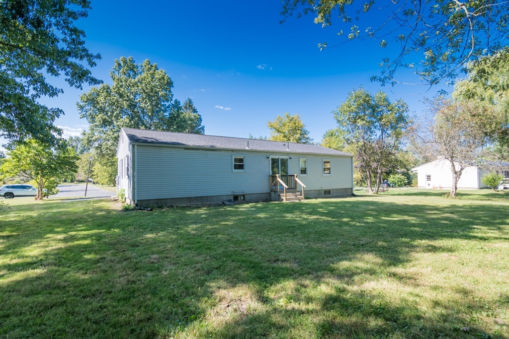 40 Farmington Road Amherst, MA 01002 - Photo 23 of 26 a view of a house with a back yard