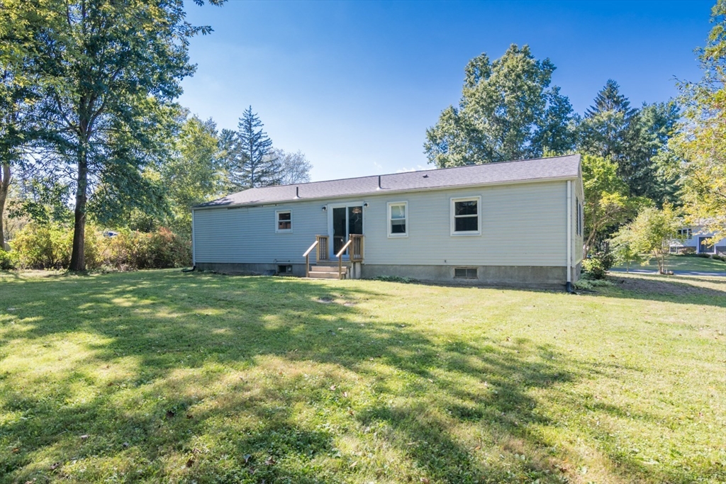 40 Farmington Road Amherst, MA 01002 - Photo 24 of 26 a view of a house with a backyard