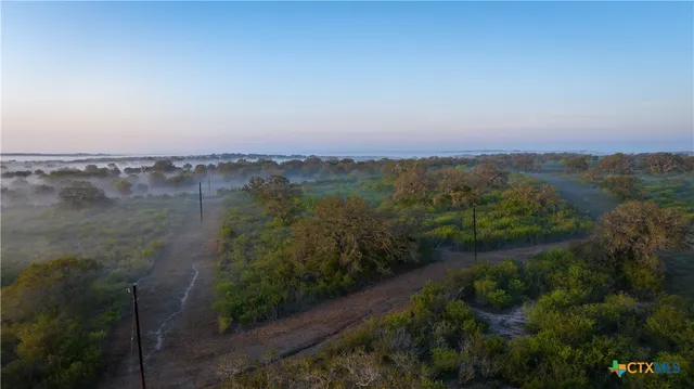 a view of a lake with a city