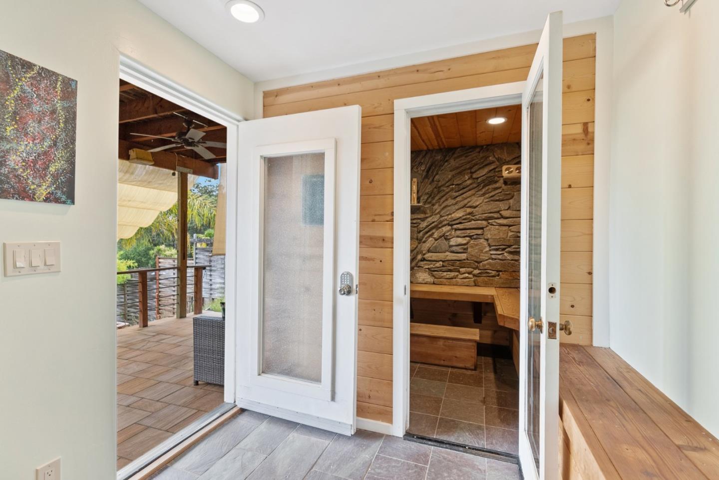 270 Estates Drive Ben Lomond, CA 95005 - Photo 16 of 61 a view of a hallway with wooden floor and windows