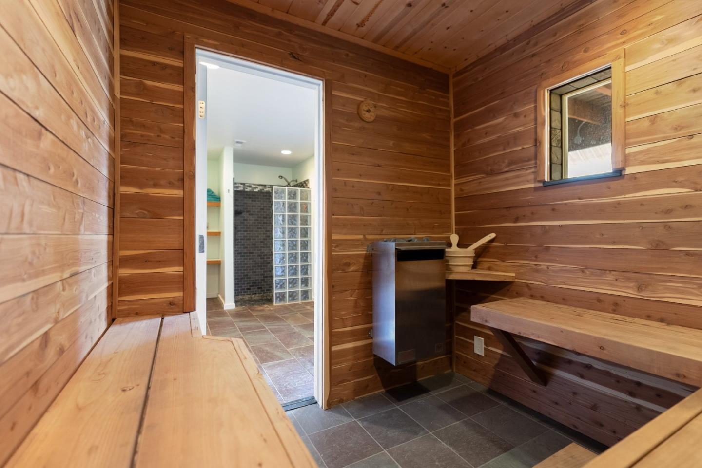 270 Estates Drive Ben Lomond, CA 95005 - Photo 17 of 61 a view of a brick house with a barbeque and wooden stairs