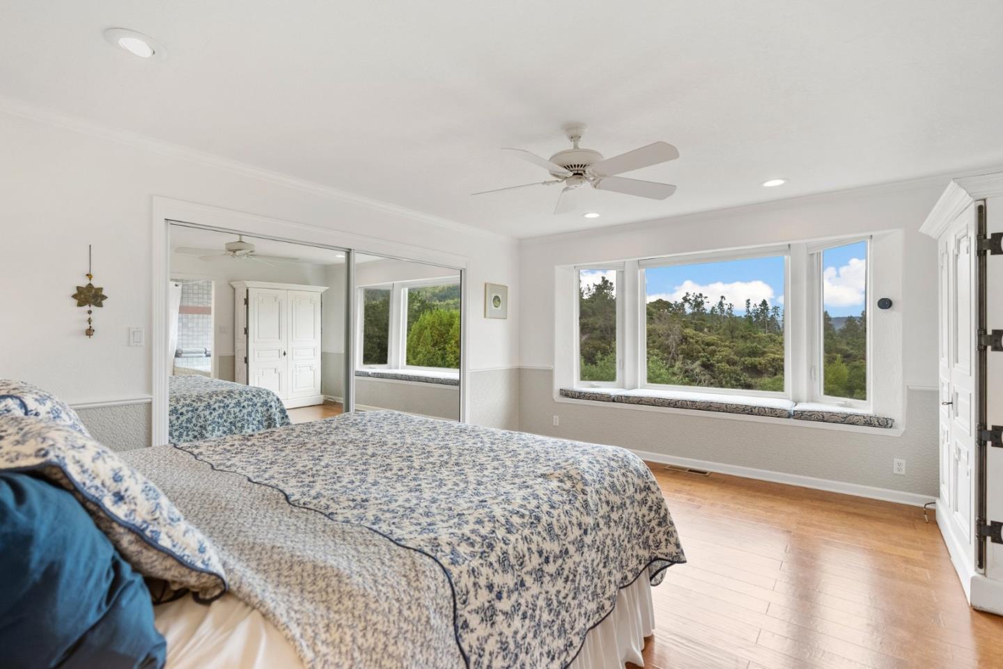 270 Estates Drive Ben Lomond, CA 95005 - Photo 38 of 61 a bedroom with a large bed and a large window