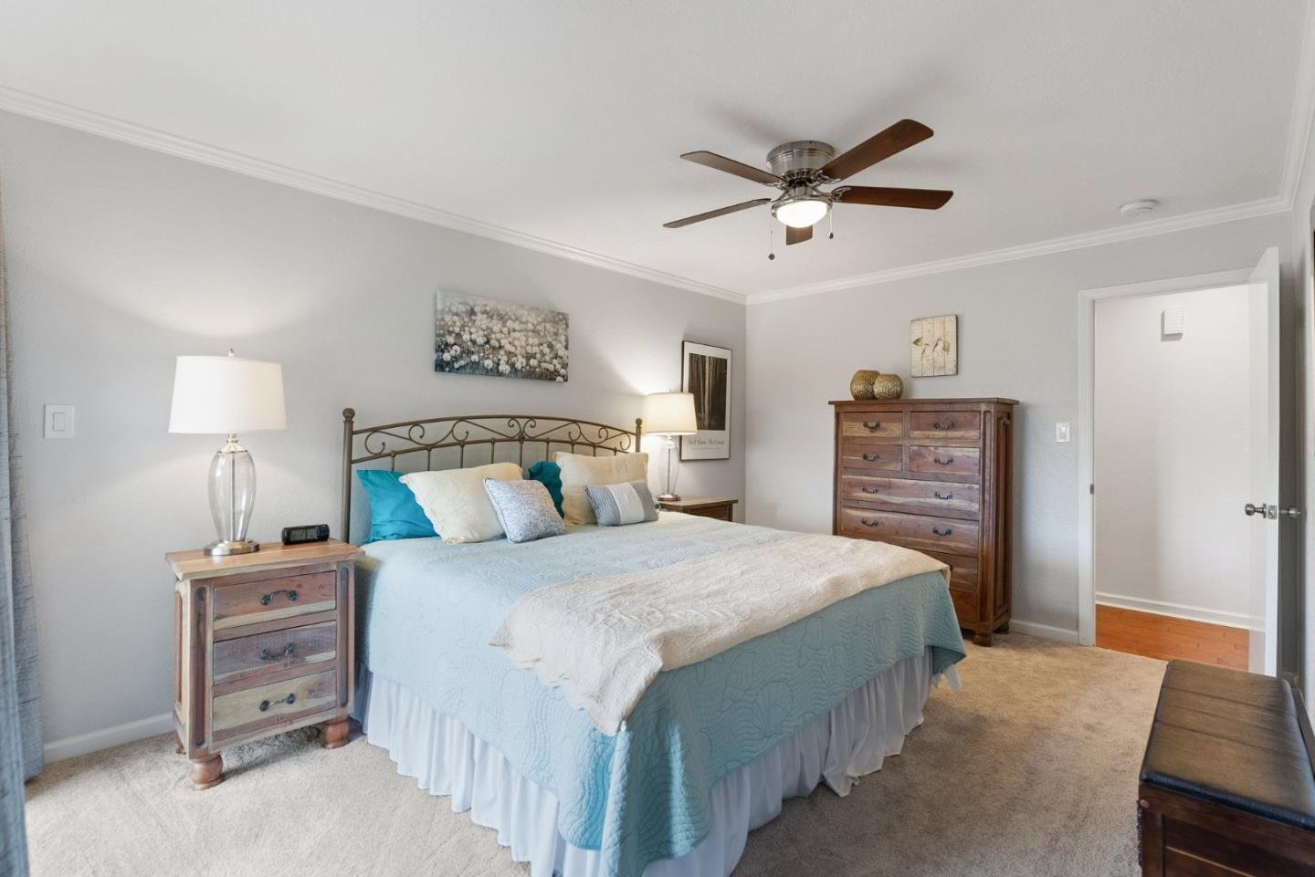 270 Estates Drive Ben Lomond, CA 95005 - Photo 46 of 61 a bedroom with a bed a dresser and a lamp