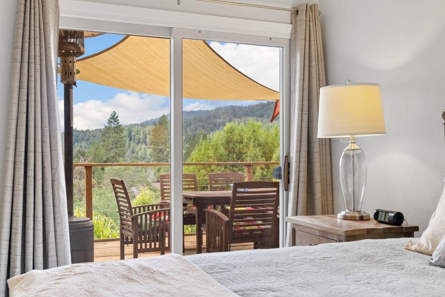 270 Estates Drive Ben Lomond, CA 95005 - Photo 47 of 61 a bedroom with a bed and a window