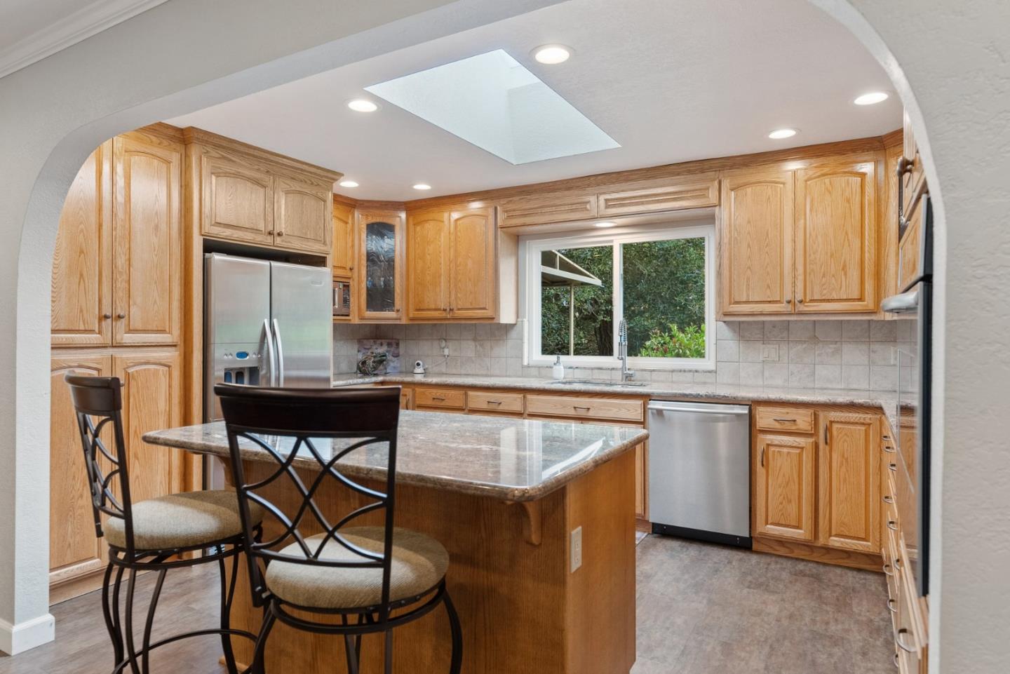 270 Estates Drive Ben Lomond, CA 95005 - Photo 54 of 61 a kitchen with stainless steel appliances granite countertop a stove a sink and a refrigerator