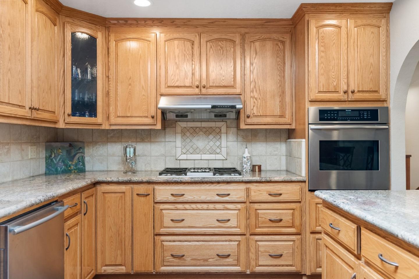 270 Estates Drive Ben Lomond, CA 95005 - Photo 57 of 61 a kitchen with granite countertop stainless steel appliances white cabinets and a sink
