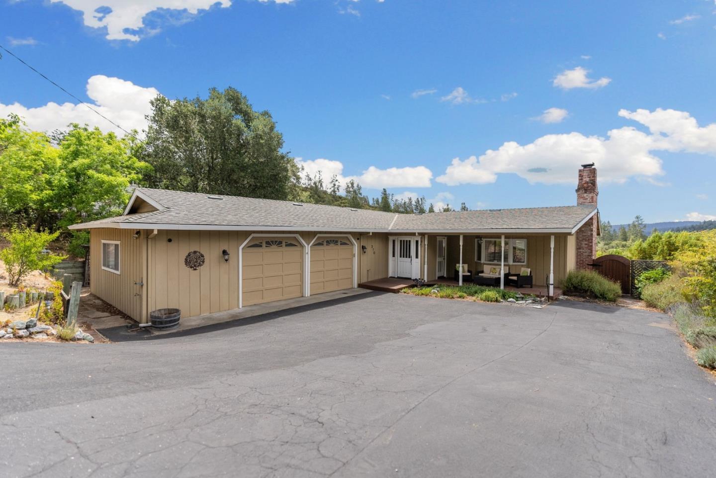 270 Estates Drive Ben Lomond, CA 95005 - Photo 7 of 61 a view of a house with a yard and large tree
