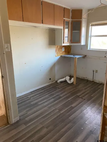 a view of a room with racks on the wall