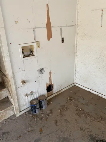 a front view of a house with parking space