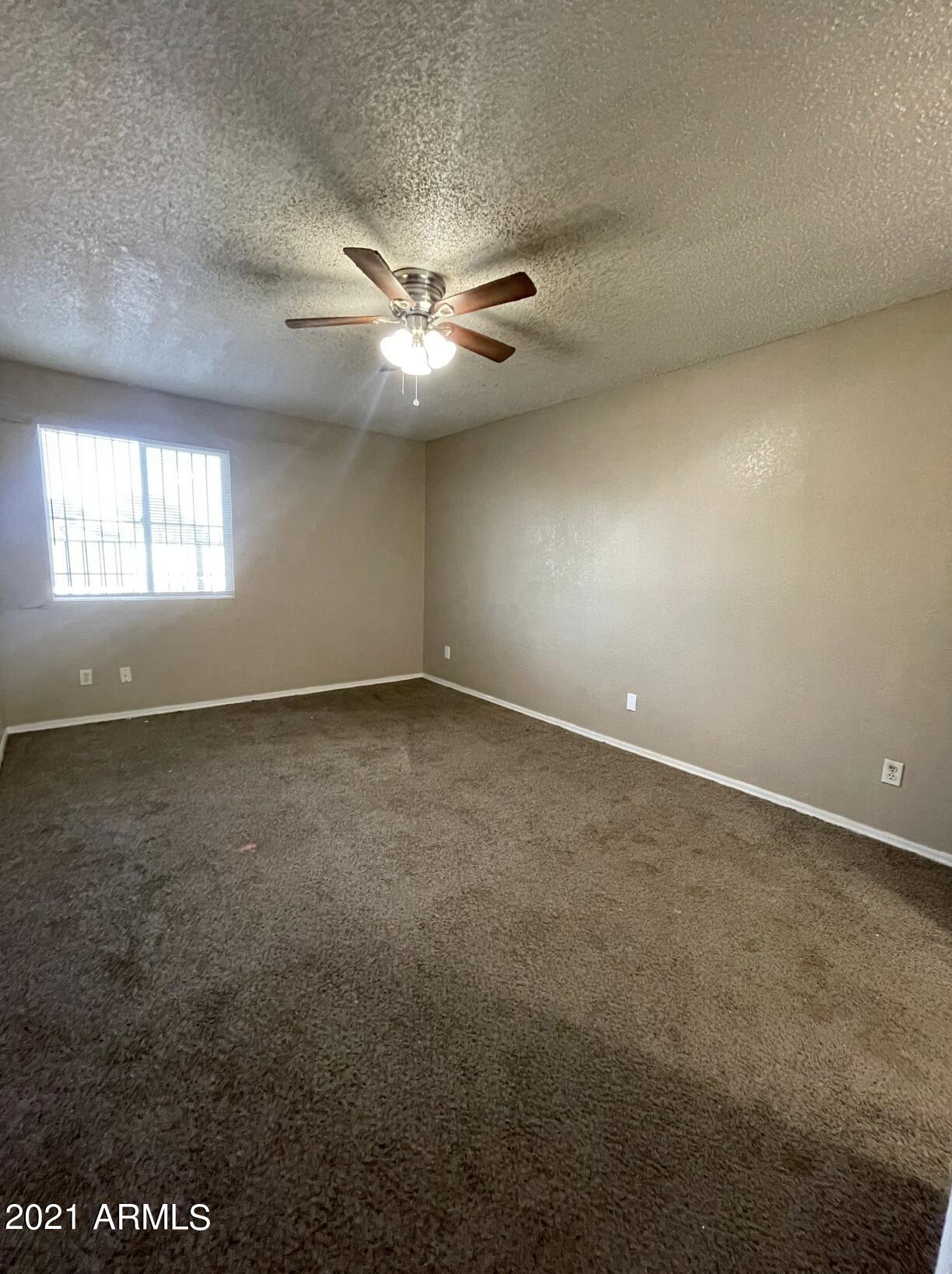 4242 North 69th Lane, Unit 1333 Phoenix, AZ 85033 - Photo 4 of 12 Screen Shot 2021-12-02 at 11.41.20 AM