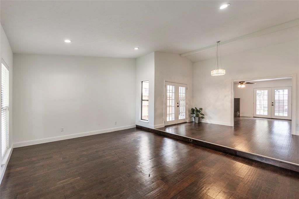 Large sunken living room flows into dining room and then the family room so three spaces to enjoy