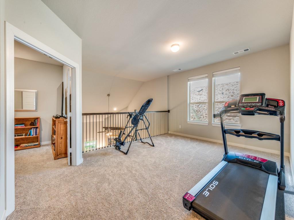 762 Corner Post Path Celina, TX 75009 - Photo 22 of 38 Upstairs is a large family room, perfect as a playroom, teenager hangout or exercise room.