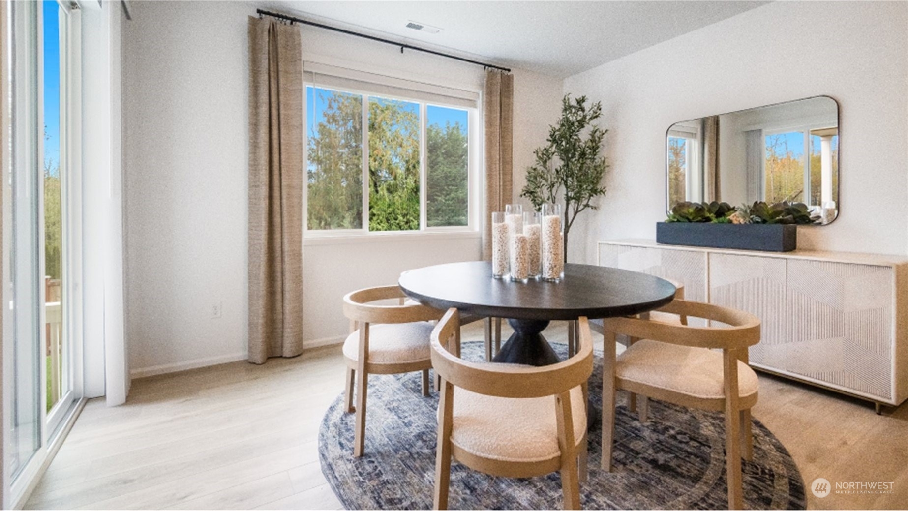 121 179th Street Southeast, Unit 1 Bothell, WA 98012 - Photo 4 of 18 a dining room with furniture and window