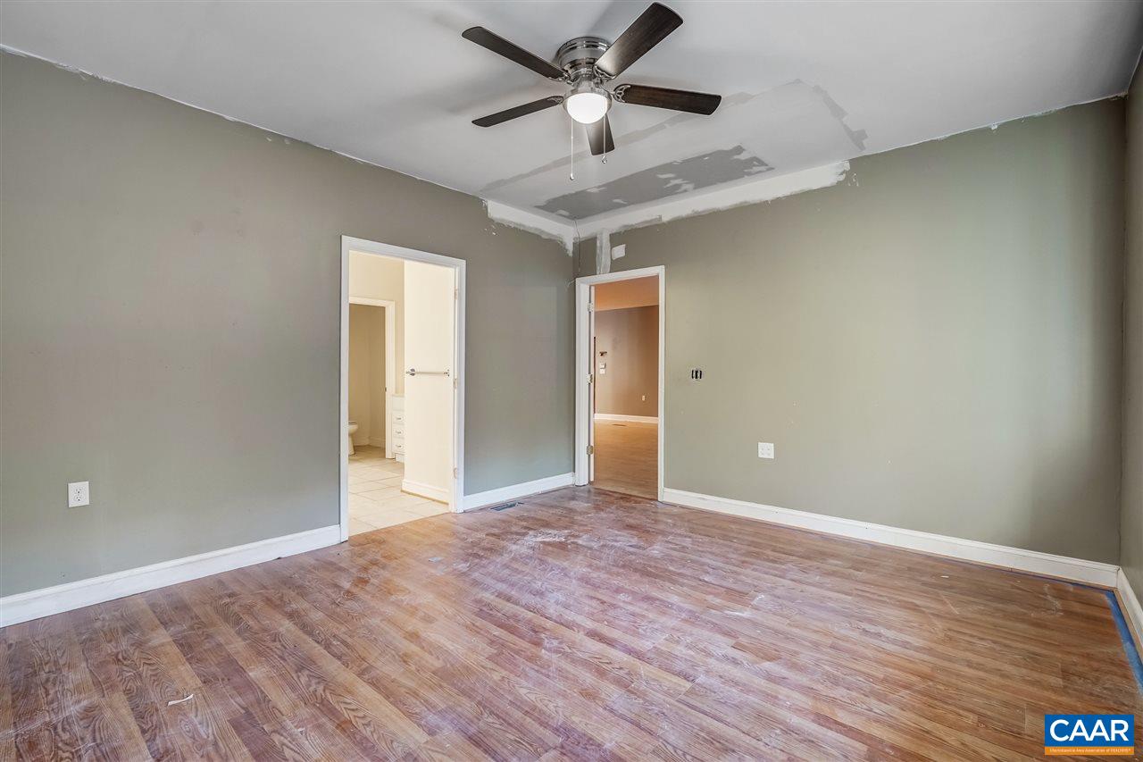 5595 New Line Road Gum Spring, VA 23065 - Photo 18 of 36 a view of an empty room and window
