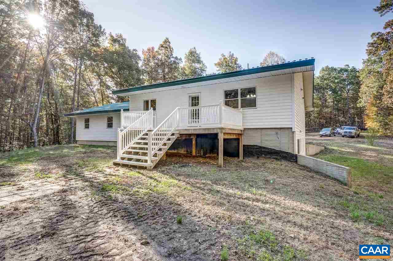 5595 New Line Road Gum Spring, VA 23065 - Photo 24 of 36 a view of a house with backyard