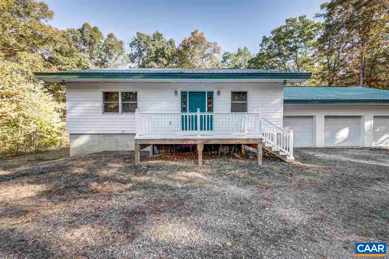 5595 New Line Road Gum Spring, VA 23065 - Photo 30 of 36 a view of a house with a porch