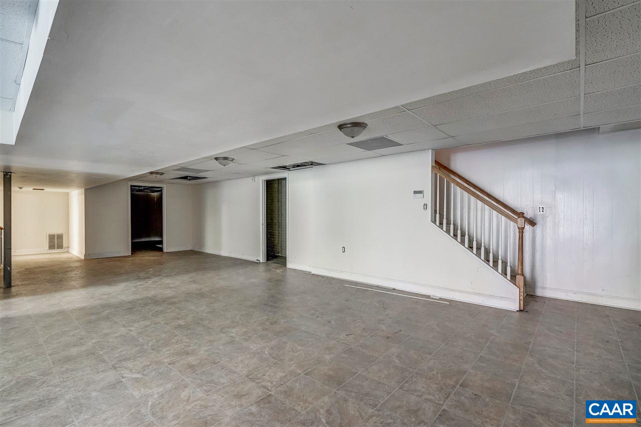 5595 New Line Road Gum Spring, VA 23065 - Photo 33 of 36 a view of a hallway with staircase