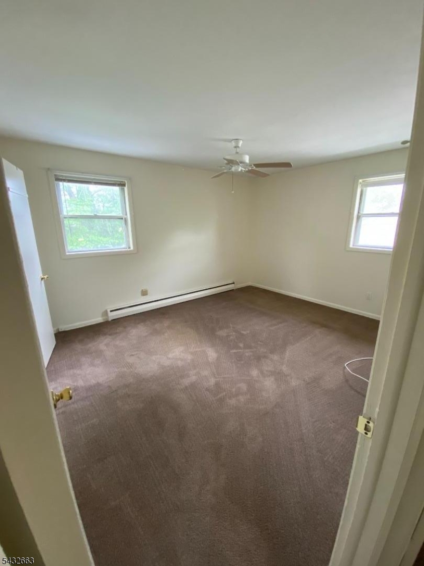 721 Lawrence Road Bound Brook, NJ 08805 - Photo 12 of 21 an empty room with a natural light