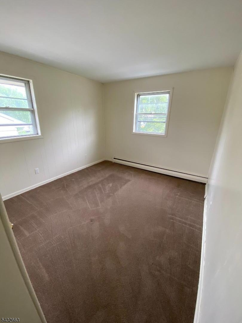 721 Lawrence Road Bound Brook, NJ 08805 - Photo 13 of 21 an empty room with a window
