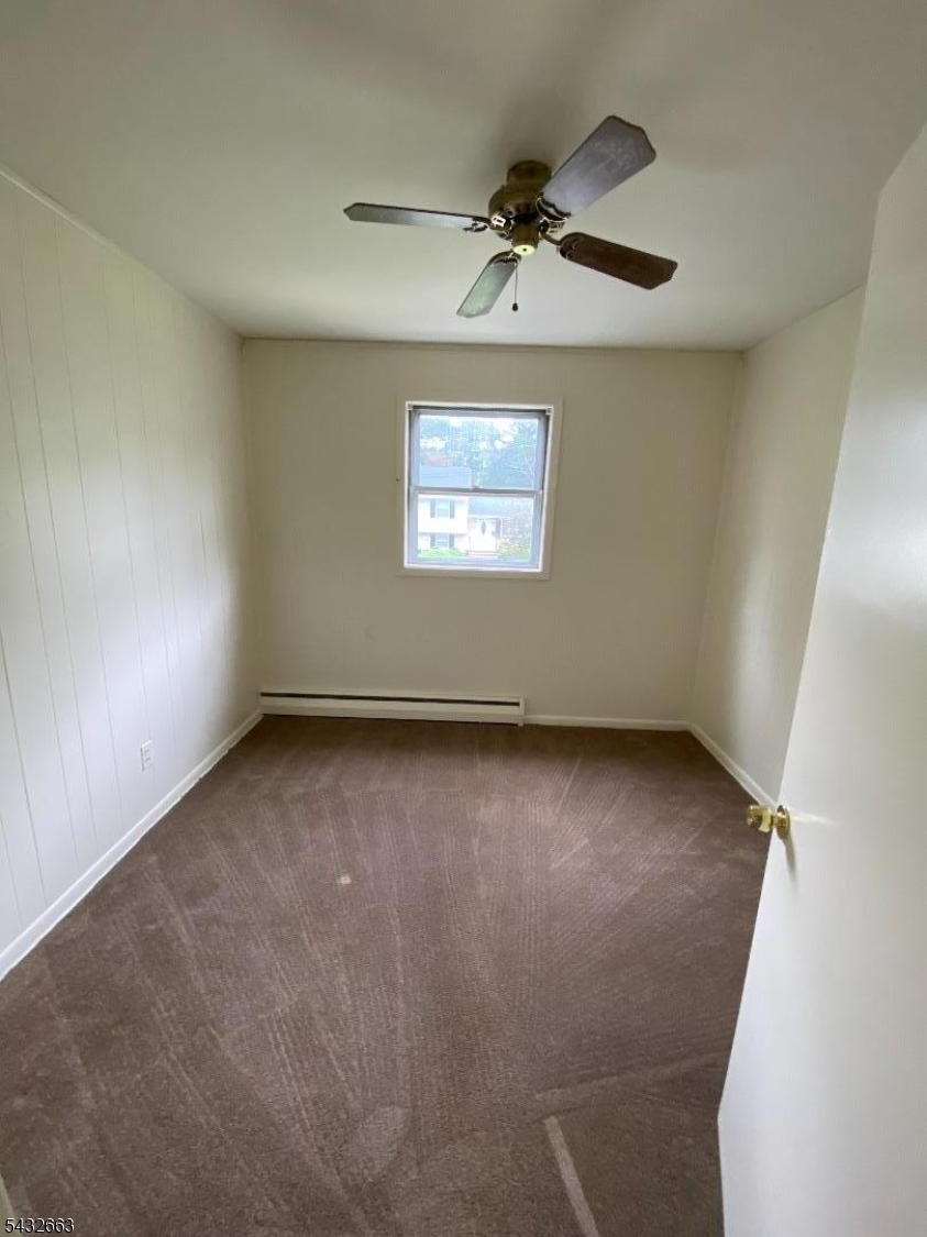 721 Lawrence Road Bound Brook, NJ 08805 - Photo 14 of 21 an empty room with a window