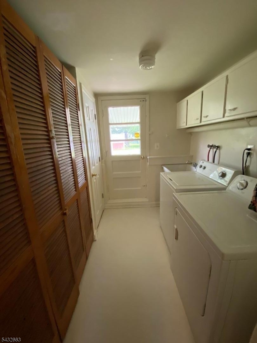 721 Lawrence Road Bound Brook, NJ 08805 - Photo 16 of 21 a utility room with dryer and washer